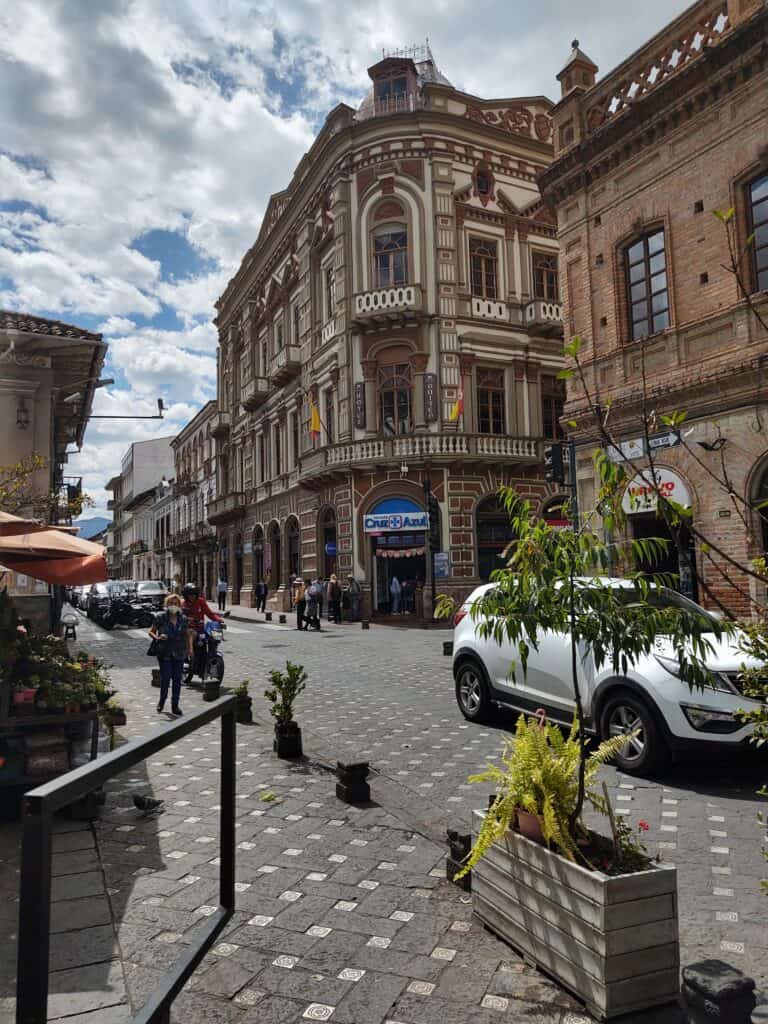 Elegant historic building in Quito with ornate architecture and balconies.